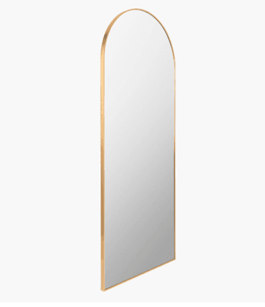 A tall, floor-standing mirror with a rounded top and a thin metallic frame. The reflective surface is a light grey color, indicating it is a mirror. The frame appears to be a polished gold or brass finish. — 3D model