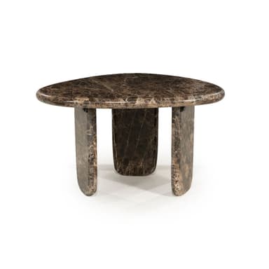A low-profile coffee table constructed entirely from dark, veined marble. The tabletop features an organic, somewhat kidney or pebble-like shape with softly rounded edges. It is supported by three thick, sculptural slab legs, each with rounded bases and edges, contributing to a substantial and monolithic appearance. The marble displays rich brown and black tones with prominent lighter veining throughout. — 3D model