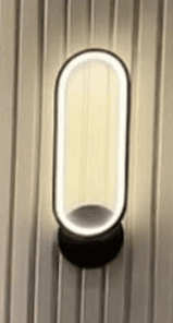 A modern wall-mounted LED light fixture with an elongated, rounded rectangular white diffuser set into a dark, possibly black, frame and base. It emits light both upwards and downwards, creating an ambient glow. — 3D model