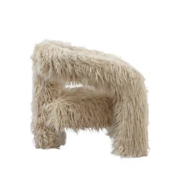 A contemporary armchair with a distinctive, organic, and sculptural form. The piece is fully upholstered and covered in a long-pile, shaggy faux fur material. Its structure is characterized by curved, continuous lines forming the seat, backrest, and armrests, with integrated legs that emerge from the main body, giving it a solid and somewhat monolithic appearance. The overall design suggests a statement piece, aiming for both comfort and visual impact. — 3D model