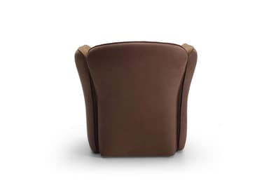 A contemporary upholstered armchair featuring a rounded backrest and integrated armrests that flow down to form the base. The chair is predominantly covered in a textured brown fabric, likely a tweed or boucle. The outer panels of the armrests, from the top down to the floor, are finished in a smoother, slightly darker brown material, possibly faux leather or a contrasting plain fabric, creating a subtle two-tone effect. The design emphasizes comfort with its soft curves and plush appearance, without visible legs. — 3D model