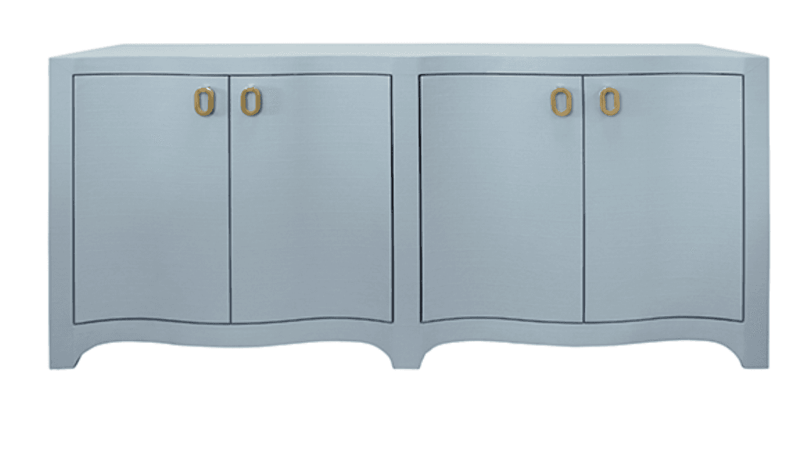 A light blue credenza featuring a textured, possibly faux shagreen, finish. It has four cabinet doors, each fitted with a distinct oval brass pull handle. The base of the credenza is characterized by a decorative scalloped design. — 3D model