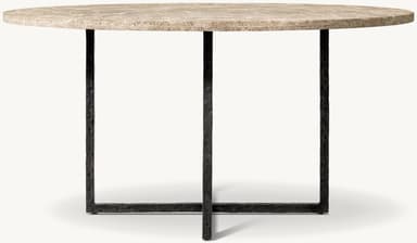 A close-up view of a round tabletop made of natural stone with a prominent veined pattern. The edge of the tabletop is visible, showing its thickness and textured surface. A dark-colored, likely metal, support structure is partially visible beneath the tabletop. — 3D model