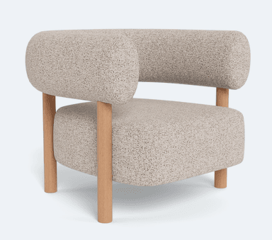 A single accent chair featuring a rounded, enveloping backrest and seat upholstered in a textured, light-colored boucle or similar fabric. The chair is supported by a minimalist frame constructed from light-toned wood, with four cylindrical legs extending from the base and two upright supports that integrate into the armrests and connect to the backrest. The design blends soft, organic curves with a clean, natural material aesthetic. — 3D model