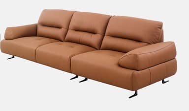 A contemporary three-seater sofa upholstered in a warm tan or light brown leather-like material. It features three distinct seat cushions and three matching back cushions, each appearing plush and inviting. The back cushions have subtle horizontal stitching details. The armrests are softly rounded and integrated into the overall frame. The sofa is elevated by four slender, angled black metal legs, providing a modern contrast to the upholstery. — 3D model