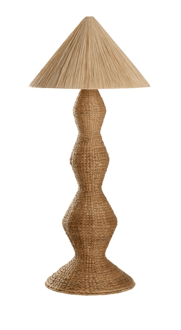 A floor lamp with a conical lampshade and a sculpted, hourglass-shaped base. Both the lampshade and the base are constructed from woven natural fibers, appearing to be straw or rattan, giving it a textured and organic appearance. The base features a series of undulating curves, widening towards the bottom. — 3D model
