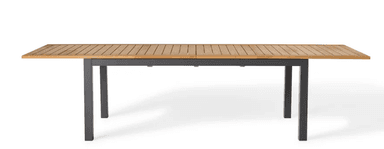 A contemporary rectangular dining table featuring a light-toned slatted wood tabletop that appears to be extendable, supported by a sturdy dark grey or black metal frame with straight, square-profile legs. The slatted design and robust materials suggest its suitability for outdoor environments. — 3D model