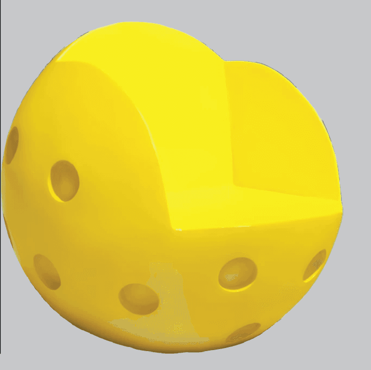 A bright yellow, spherical accent chair with a carved-out seating area and a backrest. The exterior of the sphere features several circular indentations or holes, reminiscent of a pickleball. The design is modern and playful. — 3D model