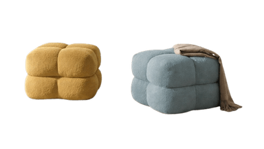 A contemporary cube-shaped ottoman featuring segmented upholstery in a textured boucle fabric. The design consists of eight distinct, rounded sections that give it a sculptural, 'bubble' appearance, upholstered in a dusty blue color. — 3D model