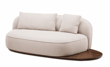 A modern, curved sofa with a plush, textured upholstery and a distinct wooden base. The sofa features two loose back cushions and a rounded silhouette, resting on an oval-shaped, dark wood platform. — 3D model