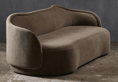 A curvaceous, two-seater sofa with a low profile and rounded armrests. The backrest features subtle vertical channel tufting, and the overall form is organic and flowing. It is upholstered in a textured fabric. — 3D model