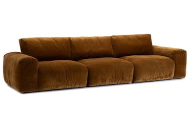 A long, low-profile three-seater sofa upholstered in a rich, warm brown velvet fabric, featuring a distinct block-like construction for the seat, back, and armrests. — 3D model