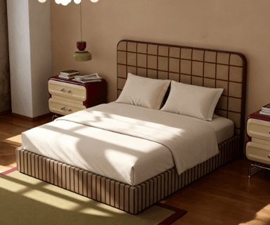 A modern upholstered bed frame with a distinctively patterned headboard and base. The headboard features a grid of square-shaped upholstery in a light tan color with darker brown piping outlining each square. The bed frame itself has a vertical striped pattern in alternating shades of brown and tan. It is dressed with cream-colored bedding, including two pillows and a duvet. Two matching bedside tables with red drawers and light-colored drawer fronts are positioned on either side of the bed. The overall aesthetic suggests a contemporary or retro-inspired design. — 3D model
