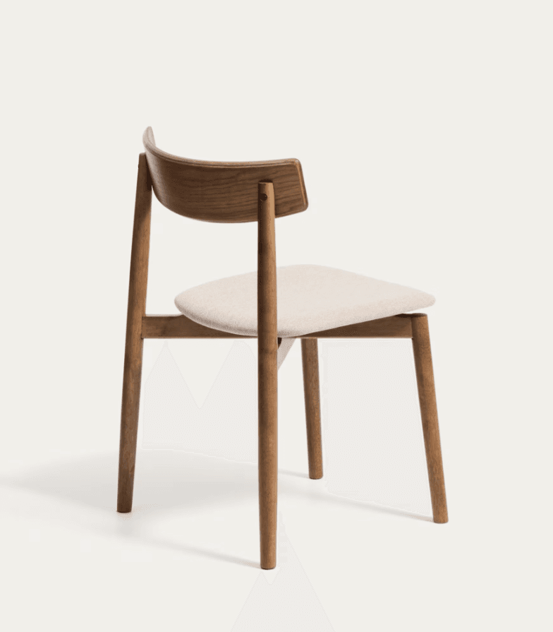 A modern dining chair featuring a solid wood frame with a curved wooden backrest and an upholstered seat. The chair exhibits clean lines and a minimalist design. — 3D model
