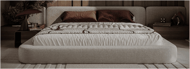 A modern upholstered platform bed featuring a low-profile design, integrated headboard, and soft, rounded edges, all covered in a light beige/greige textured fabric. — 3D model