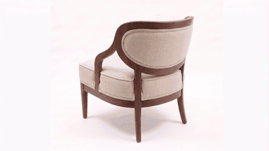 A single upholstered lounge chair featuring a prominent, curved wooden frame and light-colored fabric cushions. The dark, warm-toned wood forms a continuous backrest and armrests, embracing the padded seat and back. The chair stands on tapered wooden legs. — 3D model