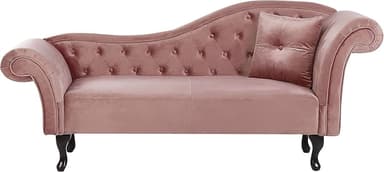 A blush pink velvet chaise lounge featuring a tufted backrest and a single scroll armrest. It includes a matching throw pillow and is supported by dark, ornate cabriole legs. — 3D model