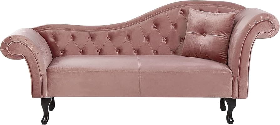 A blush pink velvet chaise lounge featuring a tufted backrest and a single scroll armrest. It includes a matching throw pillow and is supported by dark, ornate cabriole legs. — 3D model