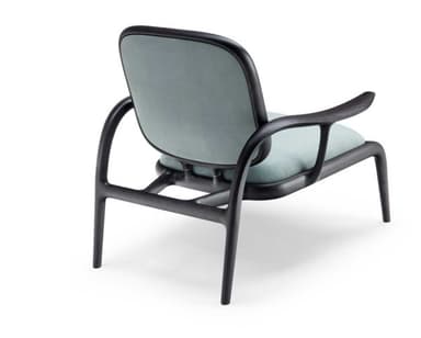 A lounge chair featuring a dark-stained sculpted wooden frame with a light blue upholstered seat and back. The frame exhibits fluid, organic curves, particularly in its armrests and integrated legs. — 3D model