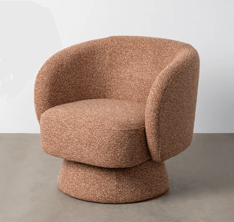 A contemporary armchair with a rounded, enveloping silhouette. It features a swivel base and is upholstered in a textured fabric. The design is compact and modern, suitable for lounge or living spaces. — 3D model