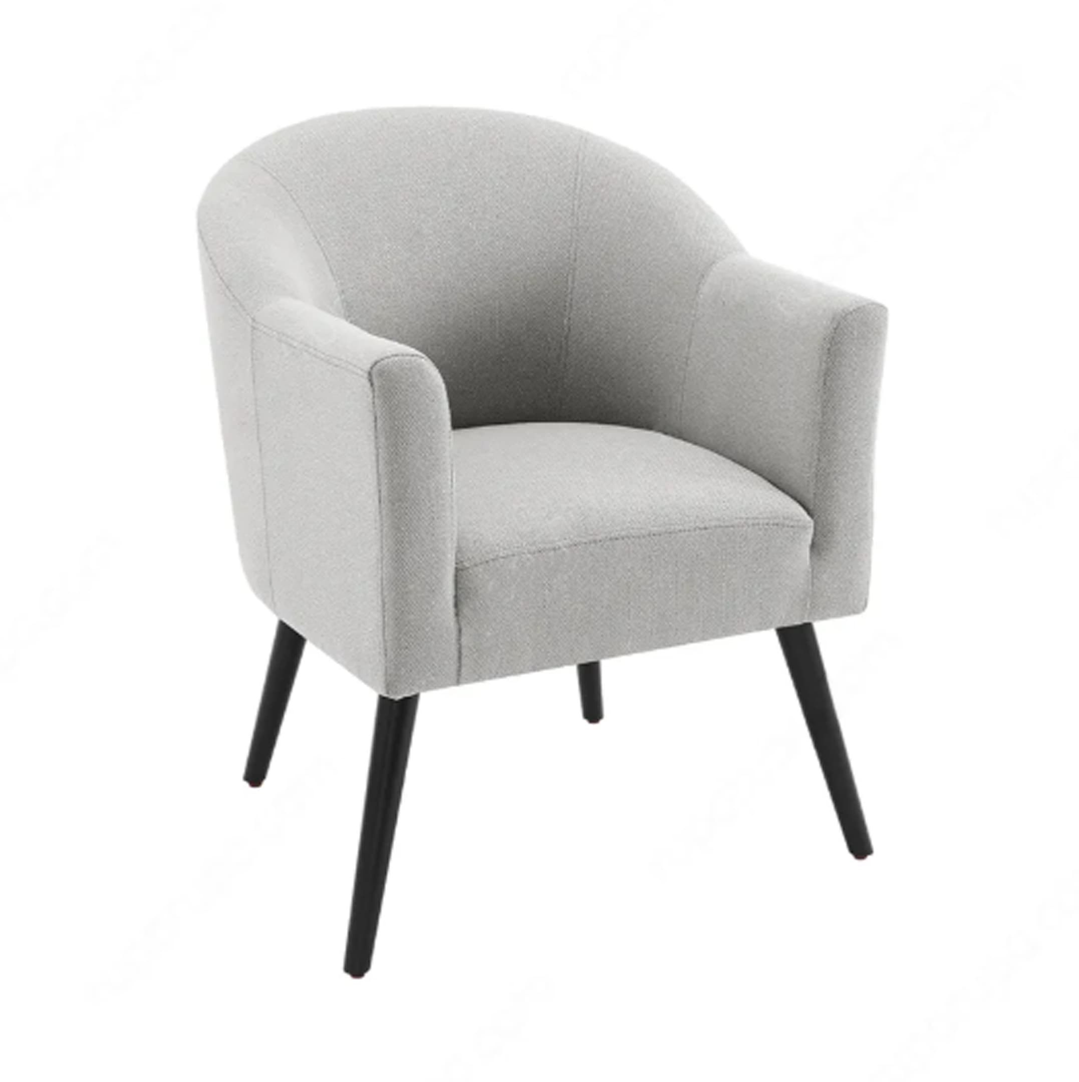 A contemporary barrel armchair upholstered in a light gray textured fabric, featuring a rounded back and integrated arms, supported by four slender, splayed black legs. — 3D model