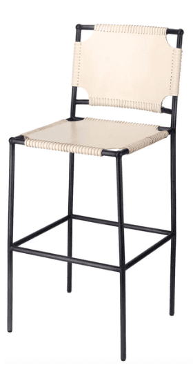 A bar stool with a minimalist design featuring a black metal frame and a woven natural-colored seat and backrest. The seat and backrest appear to be made of a durable material, possibly leather or a heavy canvas, stretched and secured to the frame with visible stitching. The frame consists of four slender legs connected by horizontal supports, forming a stable base. The backrest is rectangular and slightly reclined. — 3D model