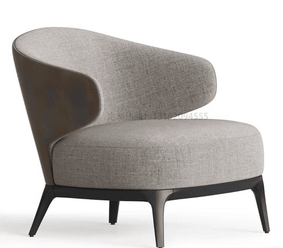 A modern armchair with a curved backrest and upholstered seat and back. The base is supported by four legs, with the front two legs slightly angled. The upholstery has a visible woven texture. The back exterior appears to be a contrasting material, possibly leather or a different fabric. — 3D model