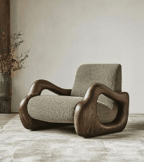 A contemporary armchair with a distinctive organic design. The frame and armrests are sculpted from dark wood, featuring fluid, curved lines. The seat and backrest are upholstered in a textured, light green fabric. — 3D model