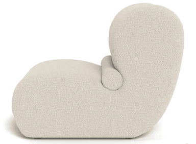 A modern armchair with a low profile and rounded edges, upholstered in a textured fabric. It features a continuous form for the seat and backrest, with a subtle horizontal division in the backrest. The overall design is minimalist and inviting. — 3D model