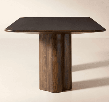 A dark stained wooden dining table featuring a rectangular top with rounded corners, supported by two cylindrical pedestal bases with vertical fluting. — 3D model