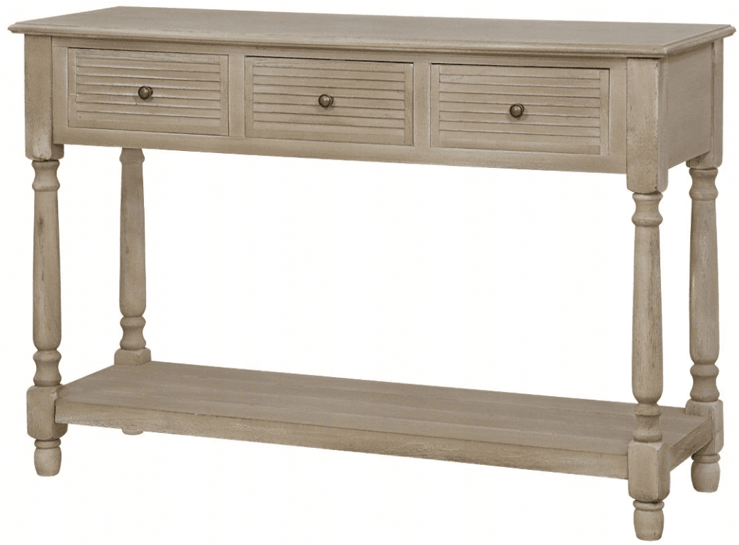 A light-colored, wooden console table featuring a rectangular top, three drawers with slatted fronts and round brass knobs, and four turned legs. A lower shelf connects the legs, providing additional storage or display space. The finish appears to be distressed or whitewashed. — 3D model