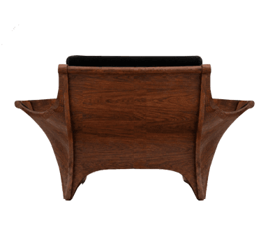 A modern armchair with a sculptural wooden base and a plush black upholstered seat and backrest. The wooden frame has a flowing, curved design that extends upwards to form the armrests, and tapers down to elegant legs. The upholstery appears to be a dark, textured fabric, possibly velvet or a similar material. — 3D model