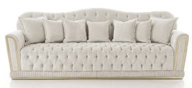 A luxurious three-seater sofa upholstered in light cream or off-white velvet, featuring deep button-tufting across the seat and backrest. The sofa has a gently curved camelback design and rolled armrests adorned with decorative gold-toned metal trim. A pleated or ribbed fabric skirt details the base, which rests on a slender gold plinth. Several matching throw pillows, some with subtle textured patterns, are arranged on the seat. — 3D model