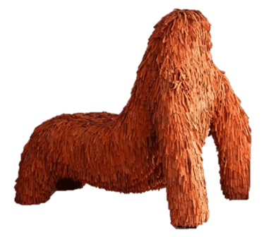 A large, organic-shaped lounge chair or seating unit, entirely covered in short, reddish-brown wooden slats or shingles, creating a shaggy, textural surface. The form is low-slung with a rising back/side, suggesting a naturalistic or abstract animal-like design. — 3D model