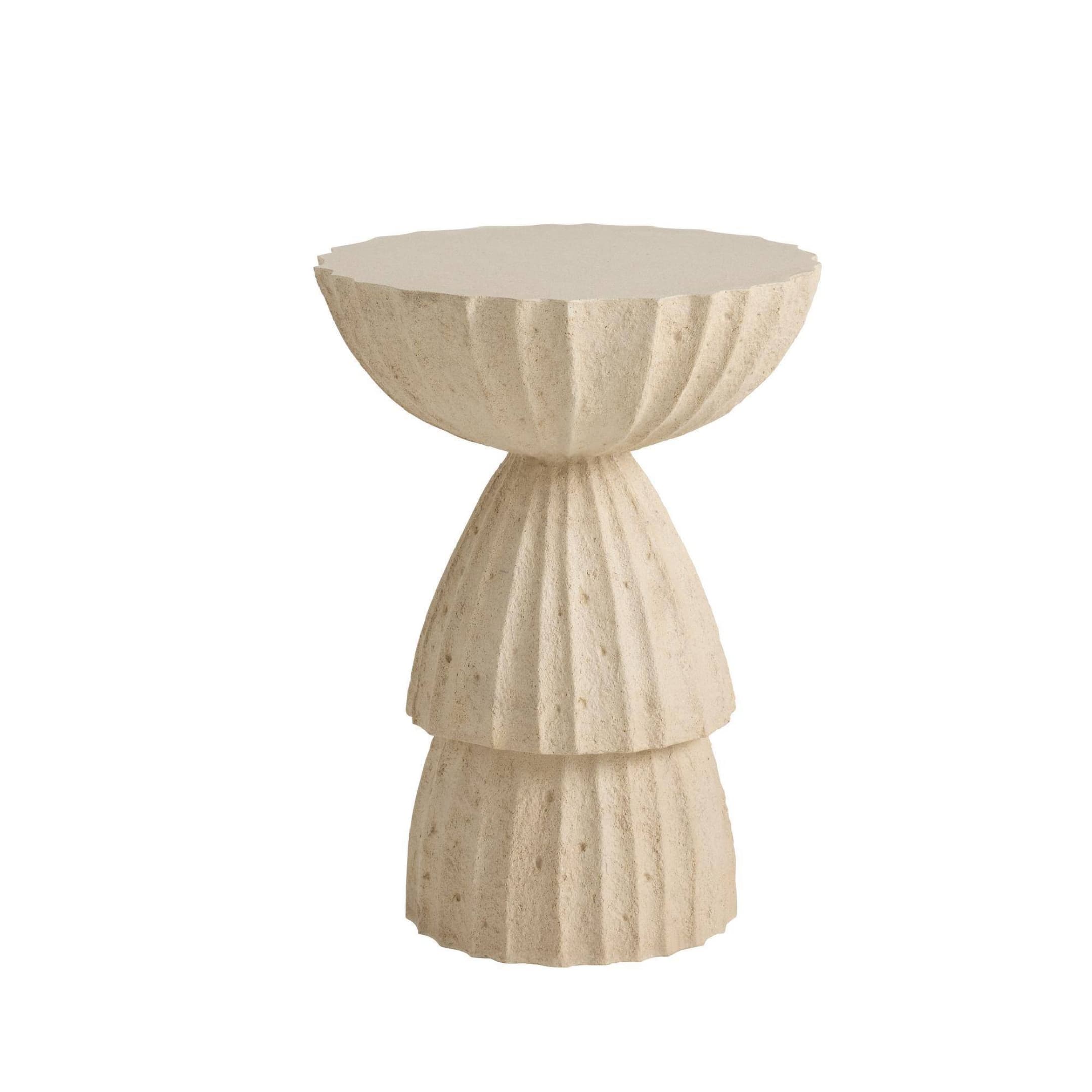 A sculptural accent table made from a light-colored, textured material, resembling concrete or stone composite. The table features a flat, circular top surface. Its base is composed of three distinct, vertically stacked elements, each showcasing a prominent fluted or ribbed texture. The uppermost base segment is shaped like an inverted bowl, transitioning into a narrower conical middle section, and concluding with a wider, more cylindrical bottom segment. The overall design emphasizes an organic, brutalist, and modern aesthetic. — 3D model
