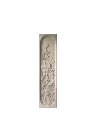 A rectangular, vertically oriented decorative panel featuring a deeply sculpted floral relief design. The panel is made of a light-colored material, likely plaster or resin, with a matte finish. The relief depicts a dense arrangement of flowers, leaves, and possibly berries, set within an arched recess at the top of the panel, extending downwards. The overall aesthetic is classical or traditional. — 3D model
