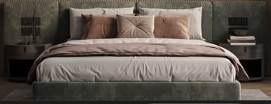 A contemporary upholstered platform bed featuring a wide, extended headboard that seamlessly integrates two round nightstands on either side. The bed frame and headboard are covered in a dark green, soft-textured fabric, suggesting velvet or suede. The headboard also incorporates electrical outlets or light switches, indicating functionality beyond mere aesthetics. The bedding consists of white sheets and pillows, accented with blush pink and light brown throw pillows and a matching throw blanket, contrasting with the dark green upholstery. — 3D model