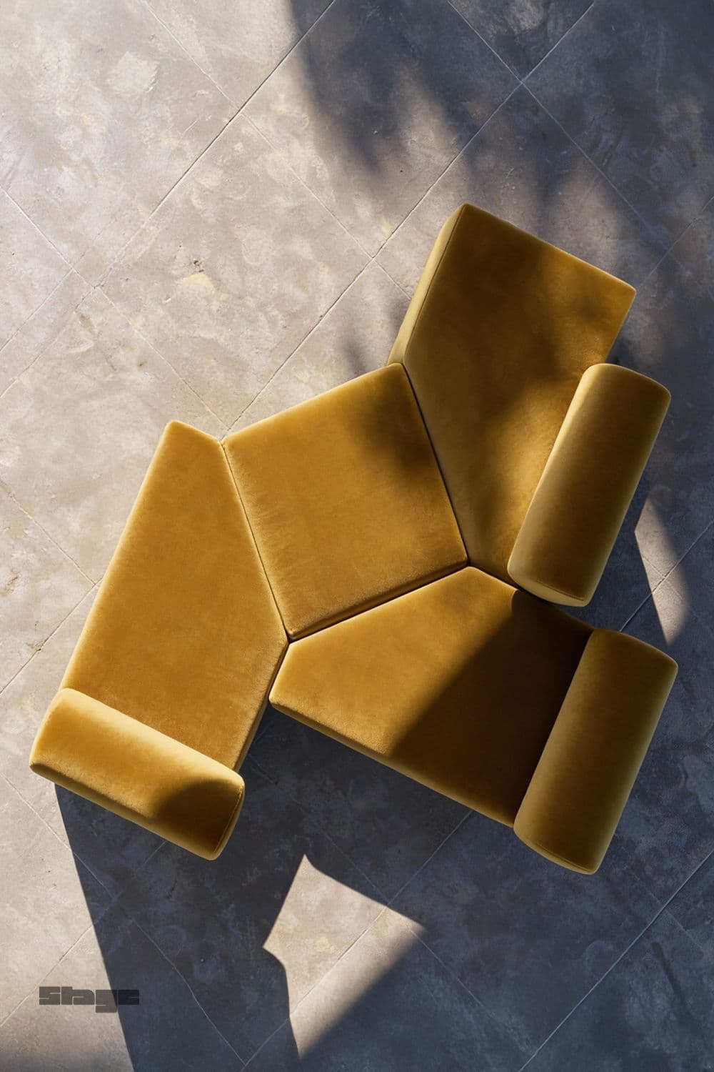 A modular sofa with an irregular, geometric design. It consists of multiple upholstered sections that can be rearranged. The sofa features cylindrical armrests or end pieces. — 3D model