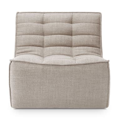 A low-profile, modular lounge chair element upholstered in a light beige textured fabric, featuring tufted back and seat cushions, designed for relaxed seating. — 3D model