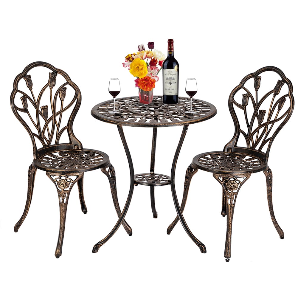 A three-piece outdoor bistro set featuring a round table and two chairs, all crafted from ornate bronze-finished cast aluminum with intricate floral and scrollwork designs. — 3D model