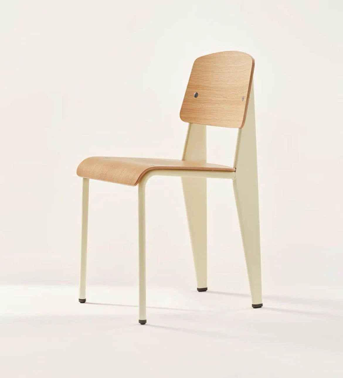A modern chair with a bentwood seat and backrest, supported by a cream-colored metal frame. The seat and back are made of light-colored plywood with visible wood grain. The metal frame consists of four legs, with the rear legs extending upwards to support the backrest. Small dark protective caps are visible on the bottom of each leg. The design is minimalist and functional. — 3D model