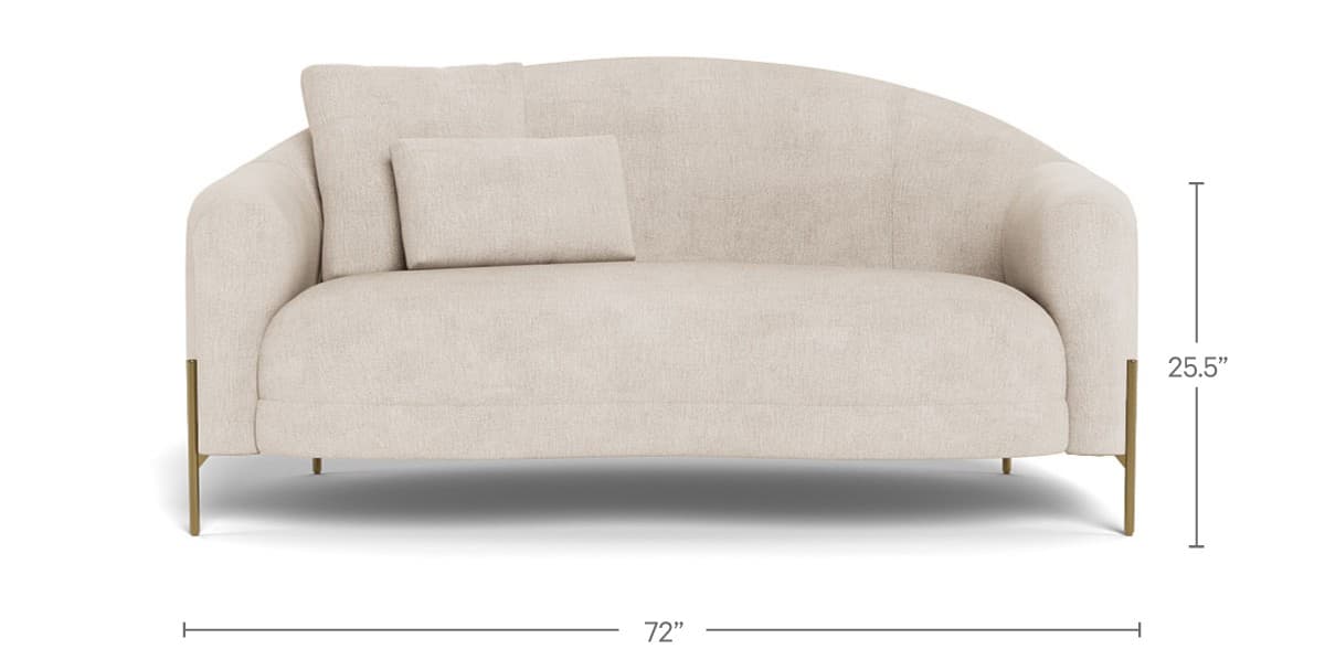 A modern loveseat featuring a gracefully curved backrest and integrated arms, upholstered in a light-colored, textured fabric. It stands on slender, angled brass legs, giving it a refined and contemporary appearance. A single rectangular lumbar pillow accompanies the piece. — 3D model