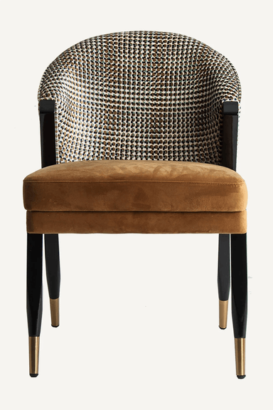 An armchair with a curved backrest upholstered in a patterned fabric, and a seat upholstered in brown velvet. The chair has four tapered legs with a glossy black finish and brass-colored caps at the bottom. — 3D model