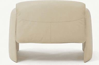A cream-colored, contemporary lounge chair characterized by its smooth, sculptural form and thick, upholstered construction. The chair features integrated armrests and legs that curve seamlessly from the main body, creating a monolithic aesthetic. It includes distinct, recessed seat and back cushions for comfort, maintaining a minimalist and organic modern design. — 3D model