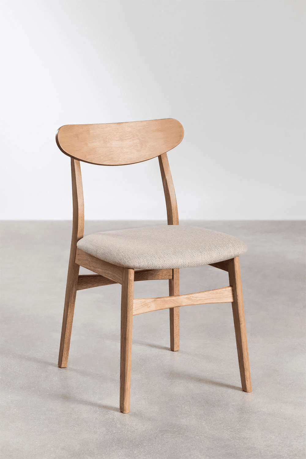 A wooden dining chair with a curved backrest and a cushioned seat. The chair has four legs connected by crossbars for stability. The design is simple and modern, with a natural wood finish. — 3D model