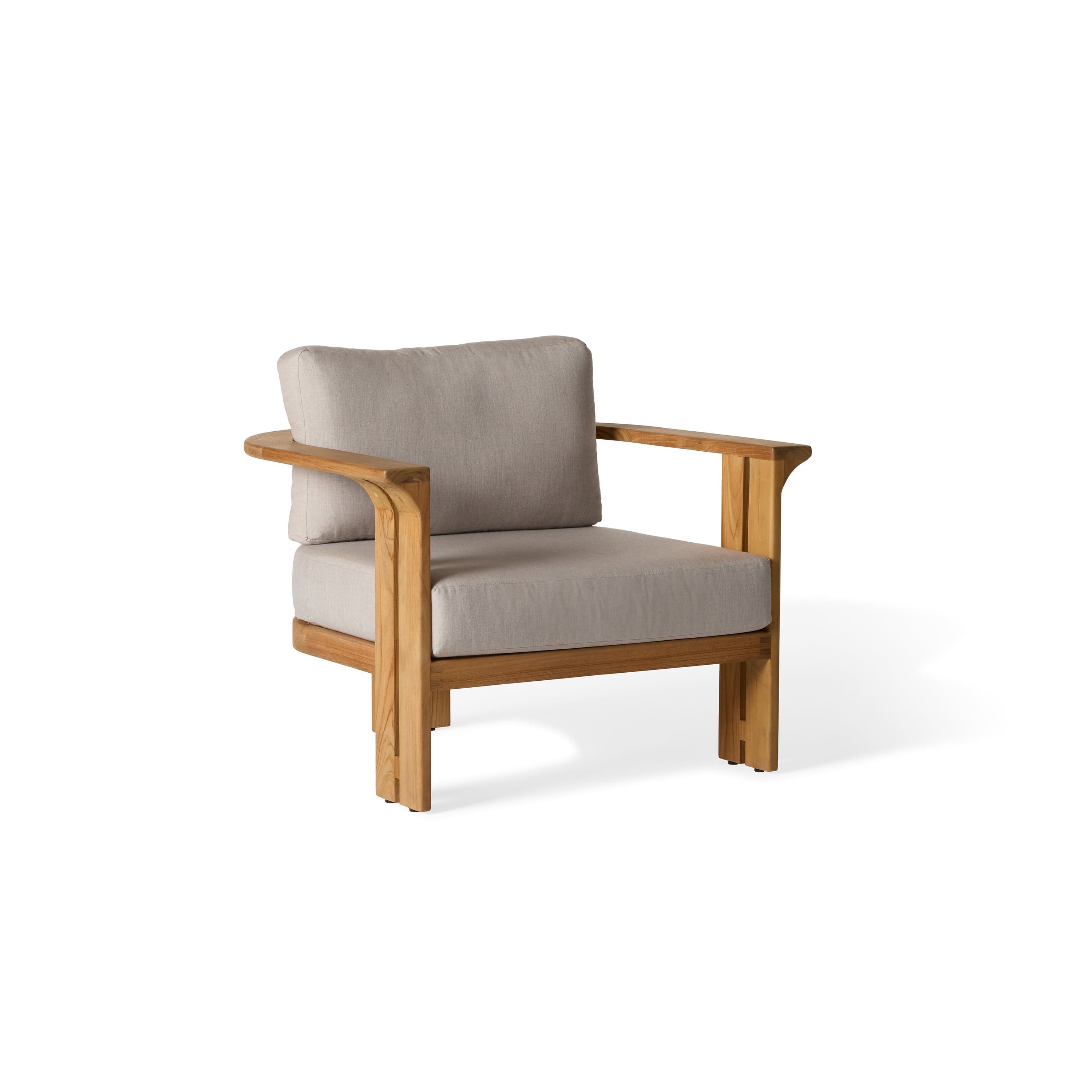 A contemporary armchair with a wooden frame and upholstered cushions. The frame consists of straight lines and geometric shapes, featuring thick armrests that extend from the back and curve slightly forward. The seat and back cushions are separate and appear to be made of a textured fabric. — 3D model