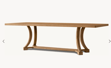 A contemporary dining table made from light-toned wood, likely oak, featuring a rectangular tabletop supported by two distinct arched pedestal bases. Each arched support is connected by a horizontal stretcher at the bottom, creating a sturdy and visually appealing structure. — 3D model