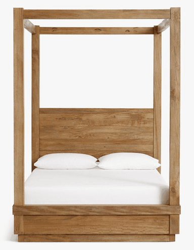 A sturdy wooden bed frame featuring a full canopy structure, four substantial corner posts, and a solid headboard. The wood displays a natural grain and a light, warm finish, with the headboard incorporating vertical carved elements. — 3D model