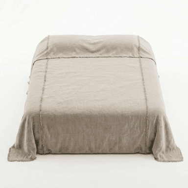 A bed with a taupe-colored duvet or comforter that appears to be made of linen. The bedding has a raw, frayed edge detail along the seams and the overhang. — 3D model