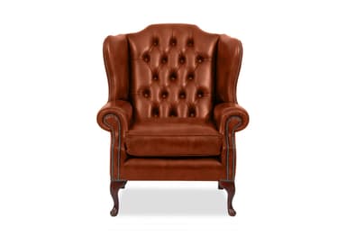 A classic wingback armchair upholstered in rich brown leather, featuring deep button tufting on its high backrest and rolled arms. The chair is accented with antique brass nailhead trim along the front of the arms and the side panels. It rests on four dark wood cabriole legs. — 3D model
